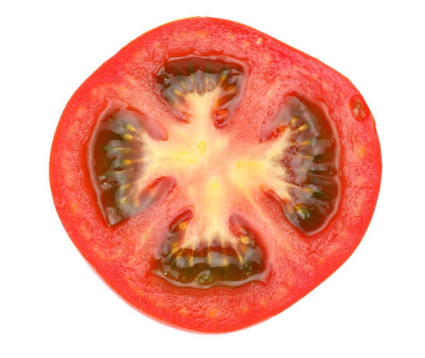 istock slice of tomato isolated on white background. top view 888674646