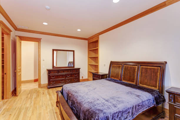 istock Welcoming mansion bedroom with a light hardwood floor 888675450
