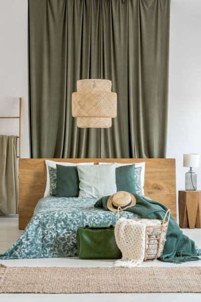istock Rattan lamp in khaki bedroom 888678022