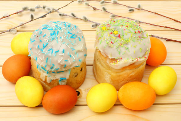 istock Easter Cake with painted eggs - Russian and Ukrainian Traditional Kulich, Paska Easter Bread on wood background 888681740