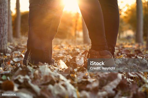 Cheerful Couple Having Fun Together During Autumn Day Stock Photo - Download Image Now