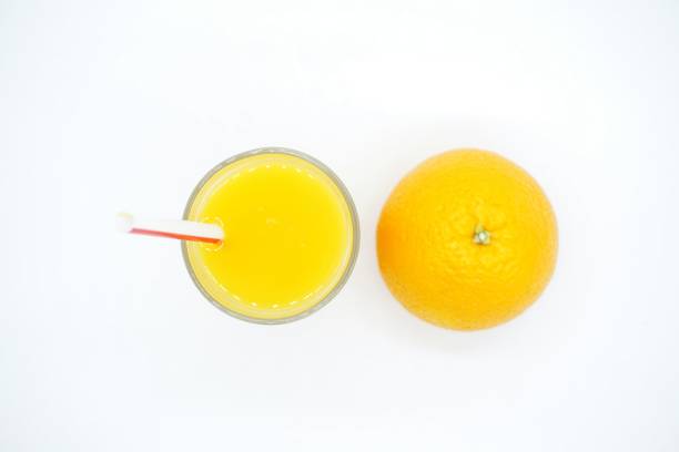 istock Glass of orange juice 888688514