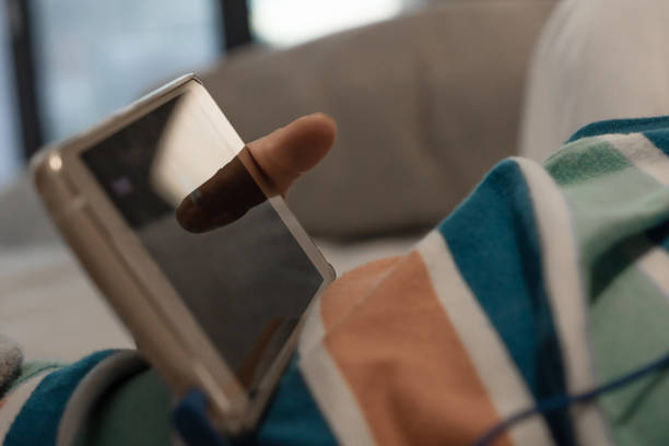 istock Close up of child using smart phone. 888716470