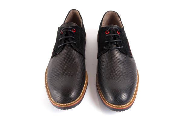 istock Male black leather shoe on white background. 888723940