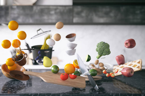 Zero Gravity in Kitchen Zero gravity concept with kitchen utensil and food zero gravity stock pictures, royalty-free photos & images