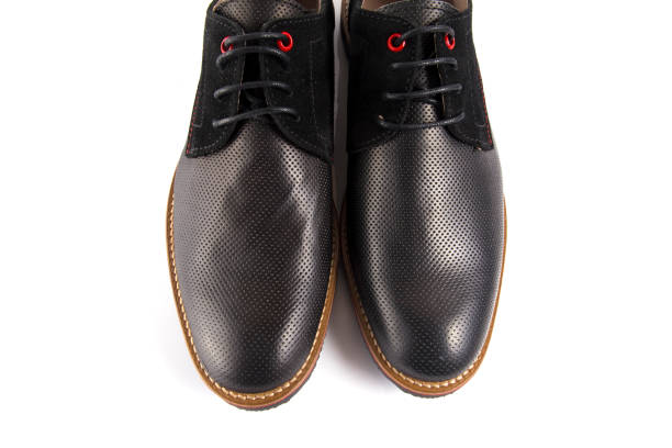 istock Male black leather shoe on white background. 888729352