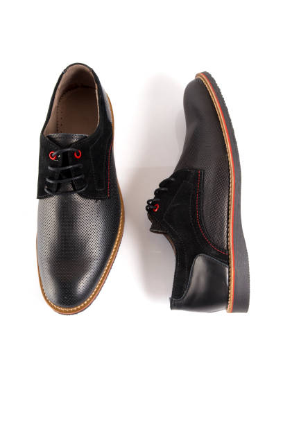 istock Male black leather shoe on white background. 888729670