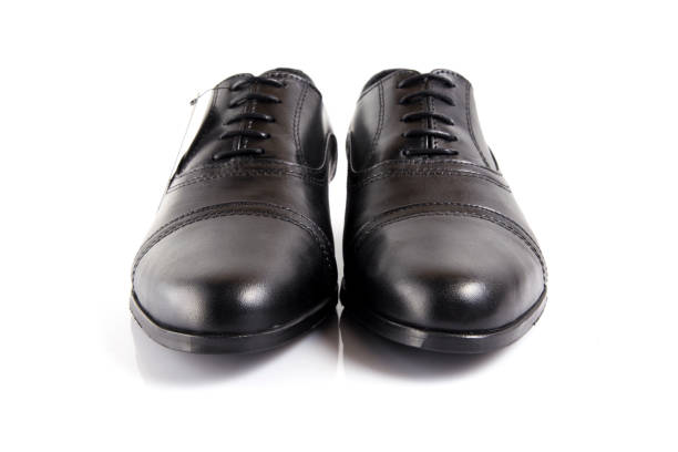 istock Male black leather shoe on white background. 888755944