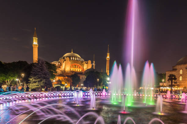 View of Hagia Sophia with fountain in the foreground, Sultanahmet Park View of Hagia Sophia with fountain in the foreground, Sultanahmet Park during Ramadan Month.ISTANBUL,TURKEY-JUNE 11,2017 azan stock pictures, royalty-free photos & images