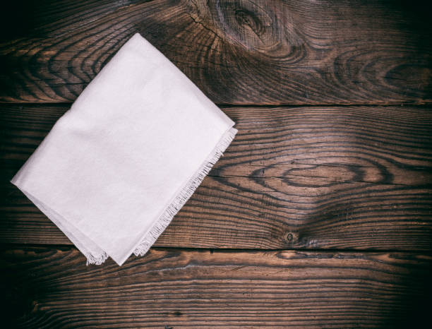 istock kitchen napkin on a brown wooden background 888759028