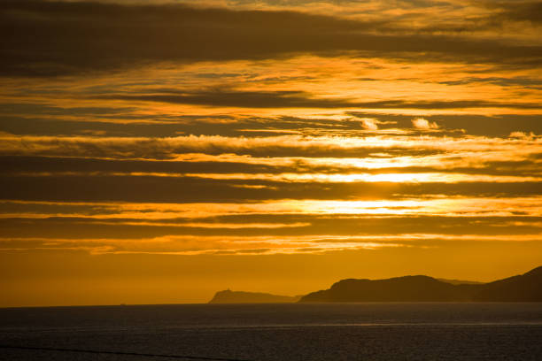 istock Golden clouds on Bantry Bay, Wild Atlantic Way , Ireland 888759728