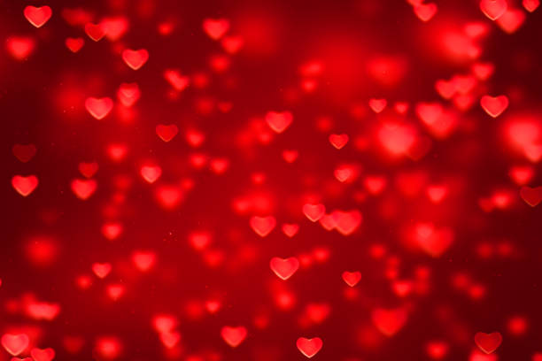 istock abstract christmas gradient red gradient background with bokeh glitter and red hearts shape flowing, valentine day love relationship holiday event festive 888760096