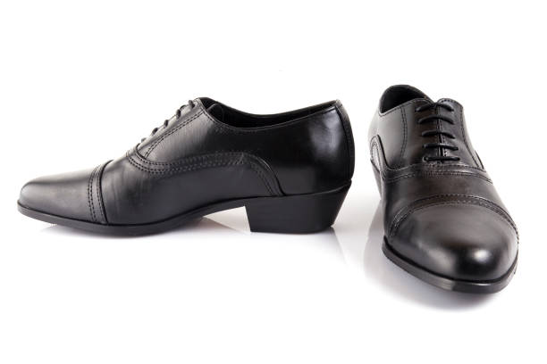 istock Male black leather shoe on white background. 888771228