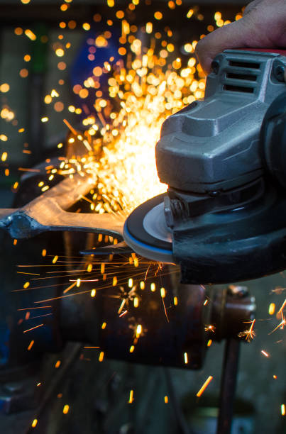 istock Industrial grinder showers sparks 888779102