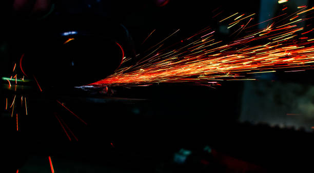 istock Industrial grinder showers sparks 888779148