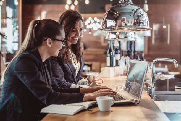 istock Businesswomen Working in The Cafeteria 888793070