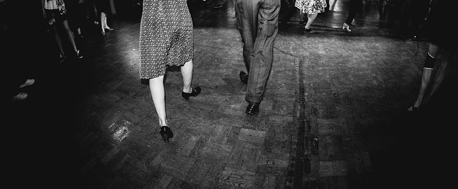 Low section of Vintage style photography people dancing