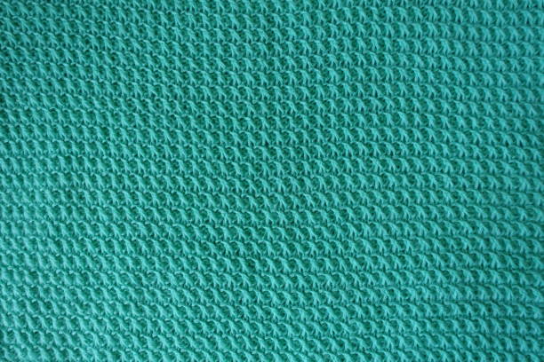 istock Handmade aquamarine knitted fabric directly from above 888801526
