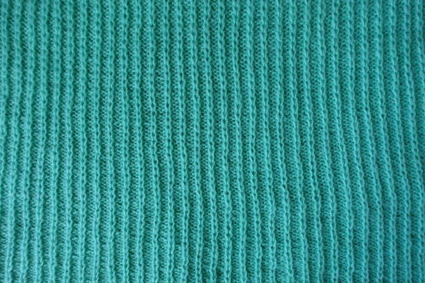 Simple vertical ribbing on handmade knitted fabric