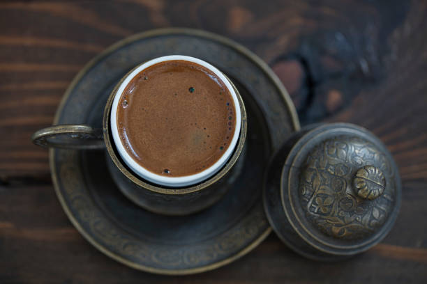 turkish coffee and turkish delights on wooden back ground