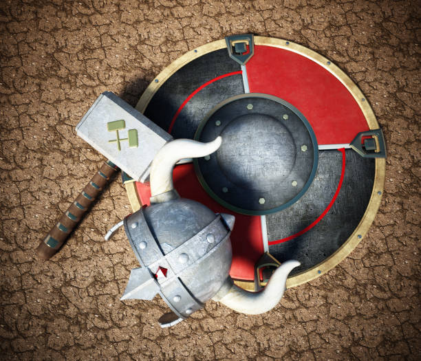 Viking helmet, round shield and hammer on cracked soil.