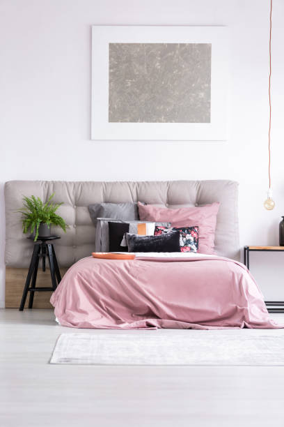 istock Gray painting above the bed 888818420