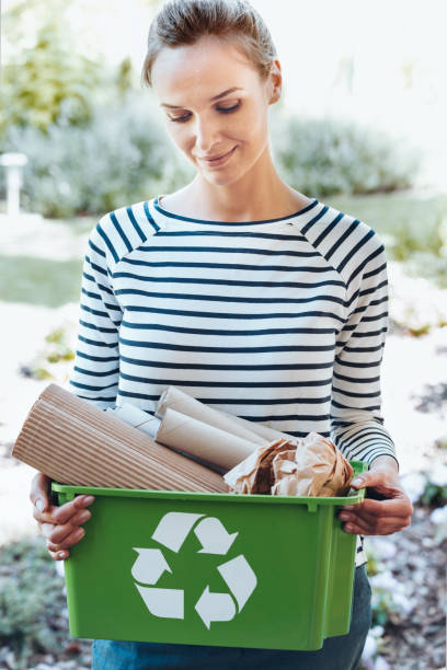 istock Satisfied housewife using recycling ecosystem 888826476