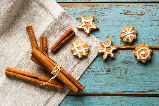 cinnamon sticks and cookies stock photo