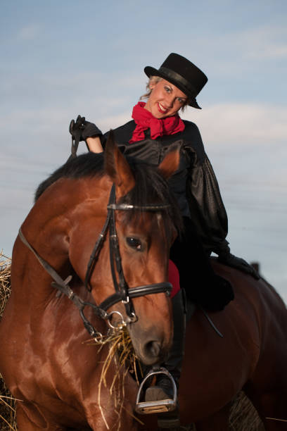 istock young woman embracing horse 888856032