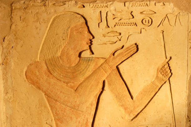 istock Ancient egypt art and hieroglyphs carved on the stone 888857152