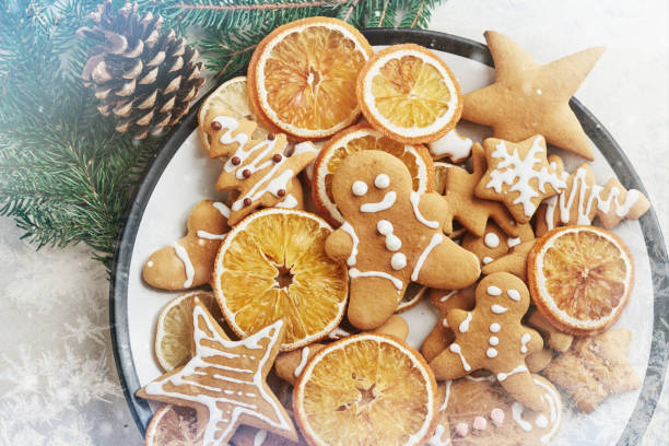 istock Christmas honey biscuits with orange. Happy New Year and Christmas. Bokeh light soft effect 888857352