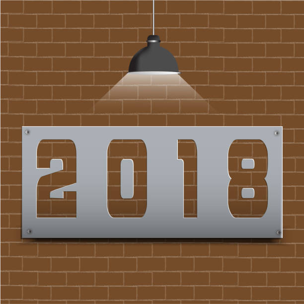 istock Happy New Year 2018 on brown brick floor and light shines. 888872594
