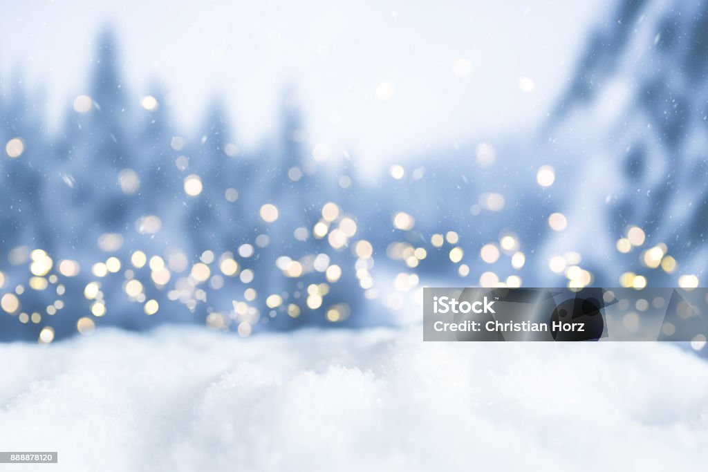 snowy winter christmas bokeh background with circular lights and trees Backgrounds Stock Photo