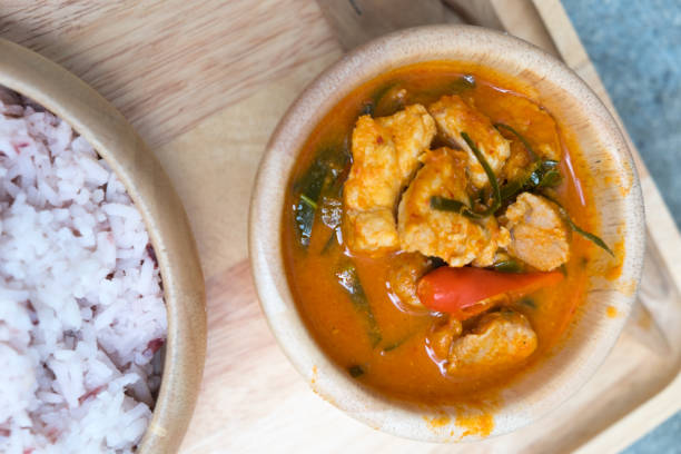 istock Thai menu, Panaeng Curry with pork eating with cooking rice 888878402