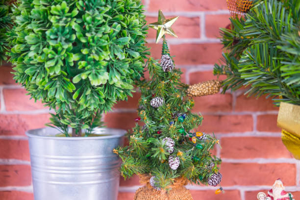 istock Mini Christmas fir tree decoration in home 888878428