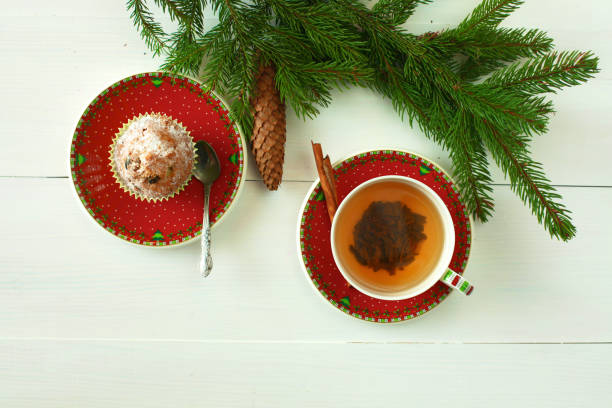 istock winter cup of tea and Christmas decorations 888884310