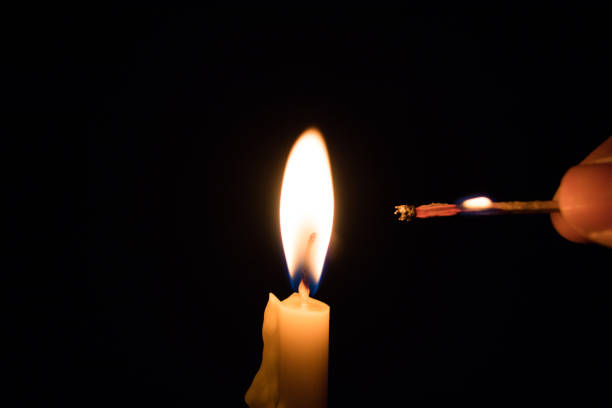 istock Fire and light from candle movement in darkness, hope, hopeless, guile, energy, classic 888889636
