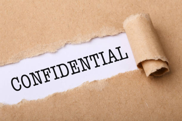 istock Paper Tear With Word Confidential 888892308
