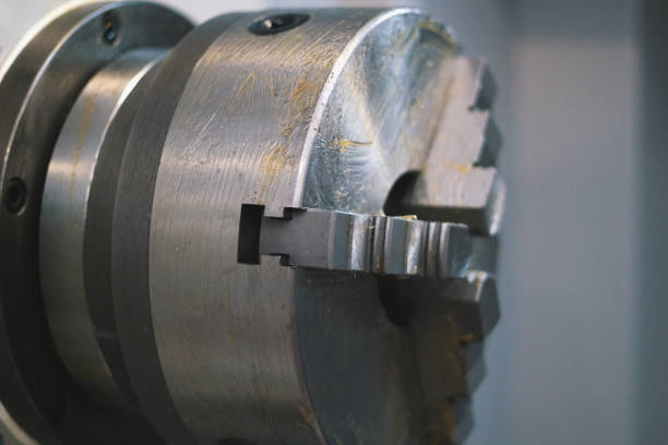 Rotated mechanism - processing of metal working, industrial background, close up