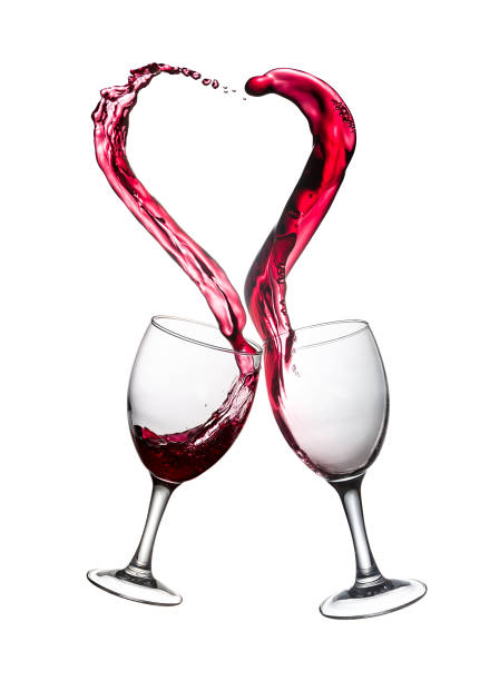 istock Two Glasses of Red Wine Abstract Heart Splash 888907398