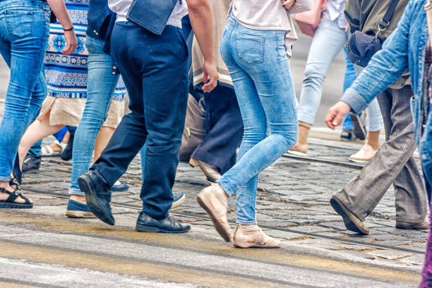 istock people walking on a pedestrian crossing 888907540
