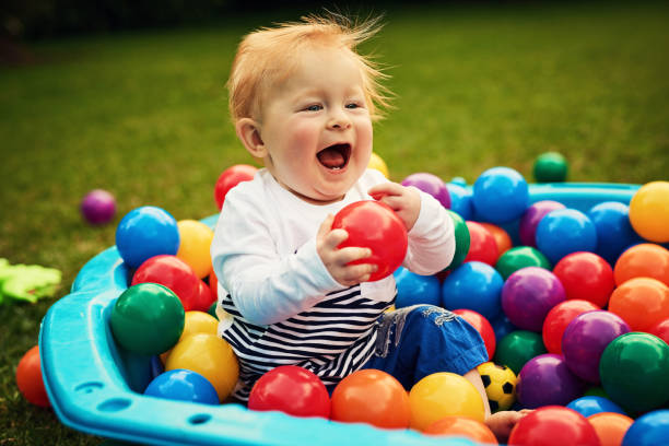 I never want to leave this place Shot of an adorable little boy playing in the backyard never stock pictures, royalty-free photos & images