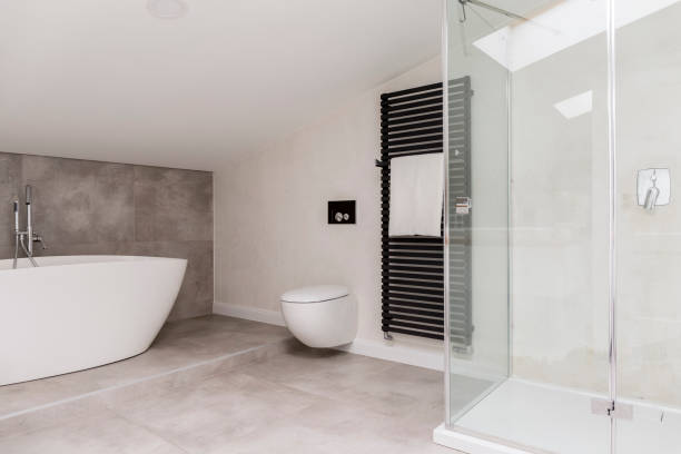 istock Glass shower in bright bathroom 888921632