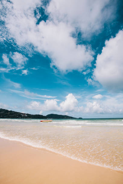 Cloudscape over beach and ocean, Phuket, Thailand