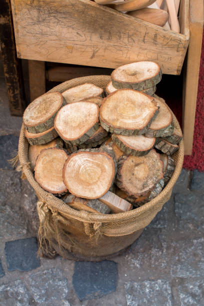 istock Wood Log cut in round thin pieces 888929434