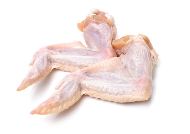 istock raw chicken wings on white  background 888929684