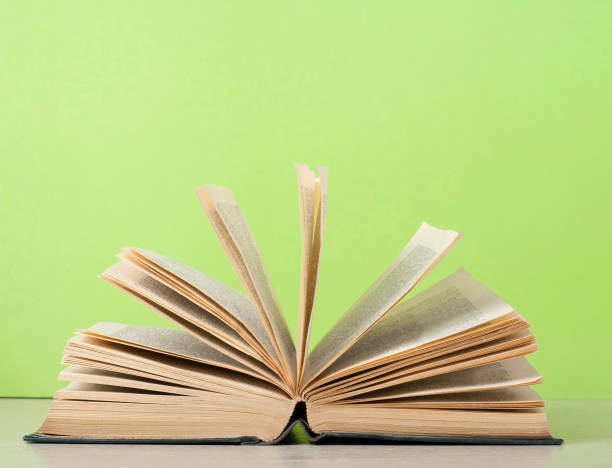 istock Open book on wooden table. Education background. Back to school. Copy space for text. 888929912