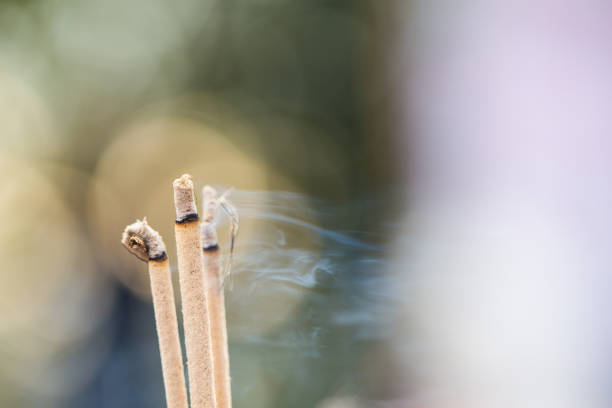 istock People are incense for Buddhist worship Buddha.-solf focus , Tample, Thailand 888949804