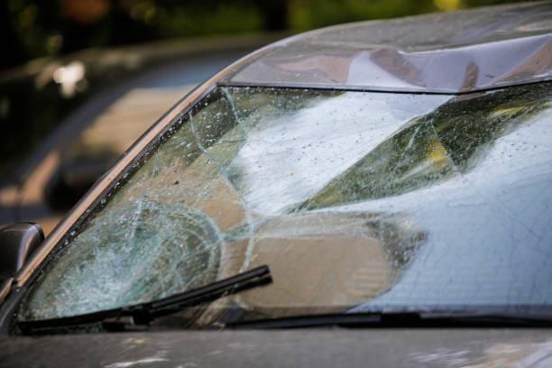 istock Damaged car after crash with motorcycle 888960202