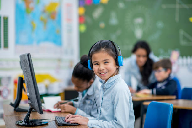 istock Smiling Girl With Headphones 888973204